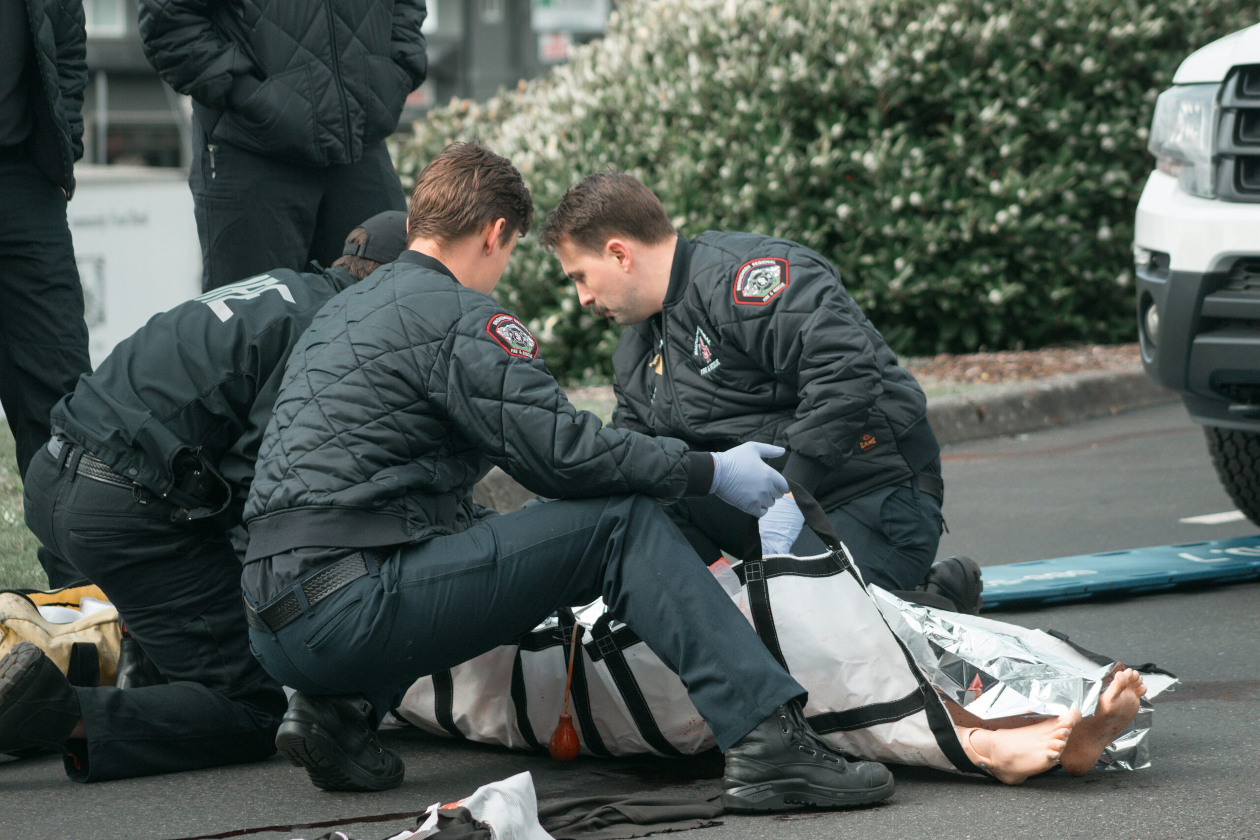 Paramedics providing emergency care in the field